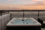 Peaceful 4-story retreat • Rooftop hot tub + Views