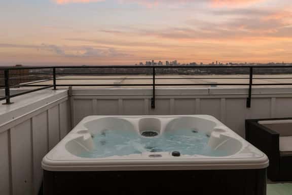 Peaceful 4-story retreat • Rooftop hot tub + Views - Image 1