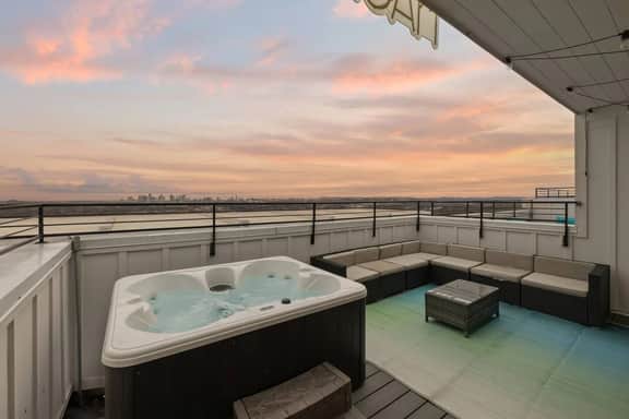 Peaceful 4-story retreat • Rooftop hot tub + Views - Image 2